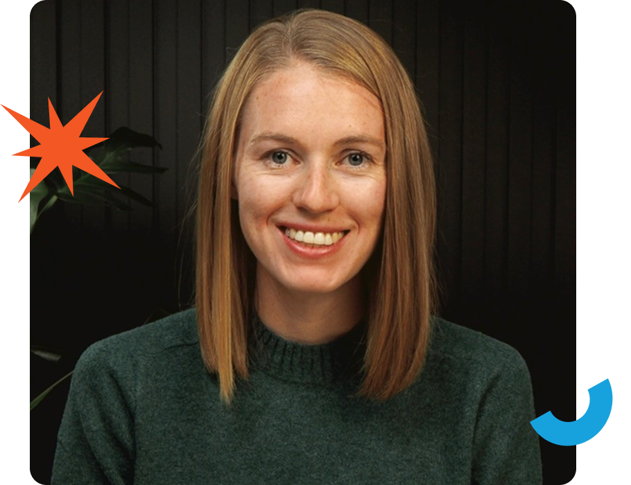 A smiling person in a green sweater against a dark background, with an orange starburst and blue curved shape on either side.